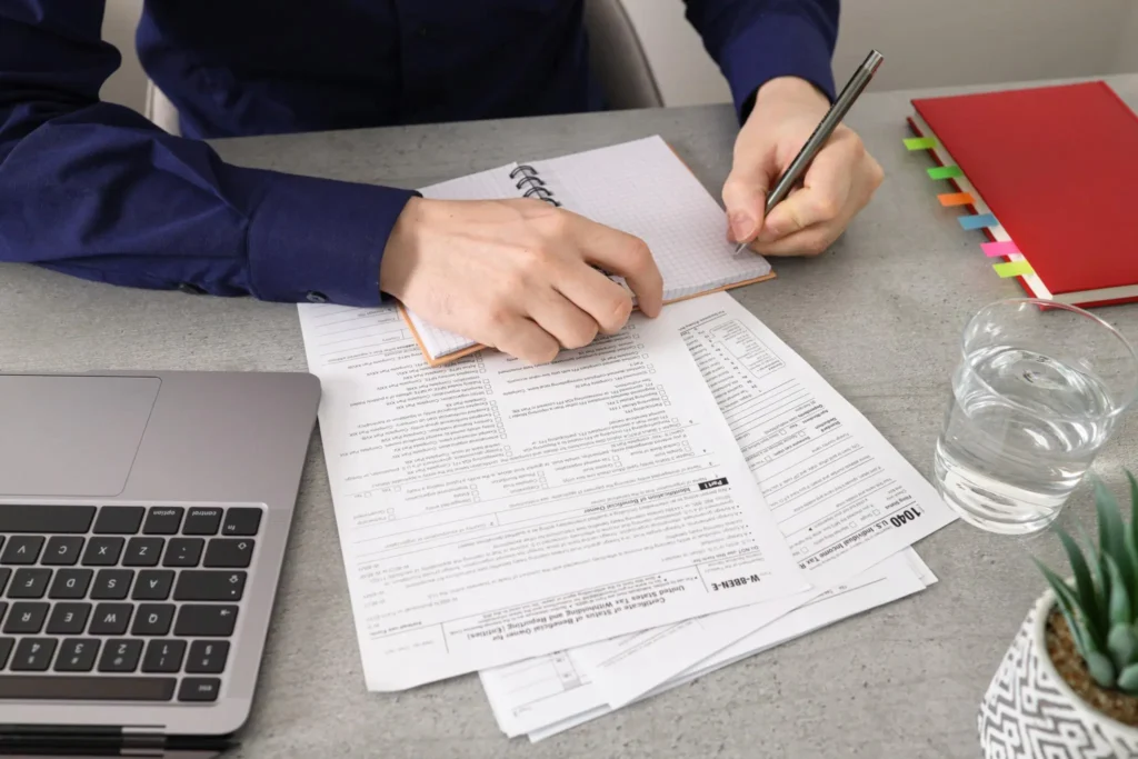 Texas property tax deductions with real estate investment documents and calculator for tax savings